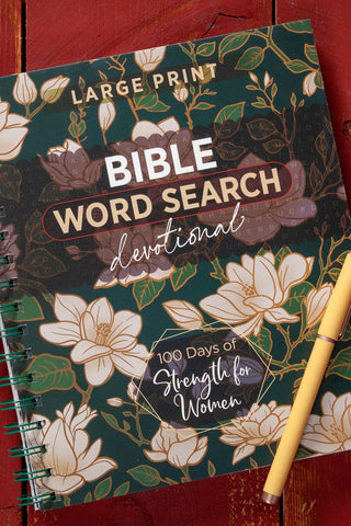 Bible Word Search Devotional book with flowers and a cup of coffee on a wooden surface