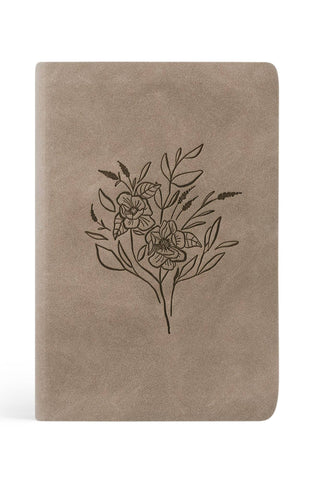 Beige notebook with floral illustration on a white background