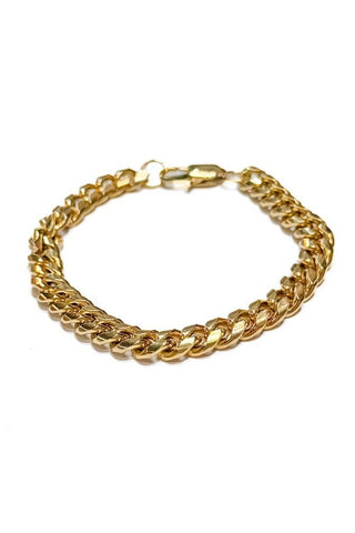 Gold chain bracelet on a white background