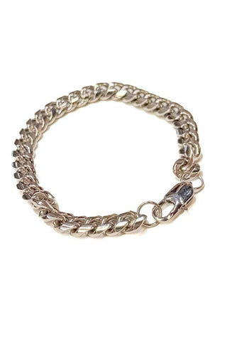 Silver chain bracelet on a white background