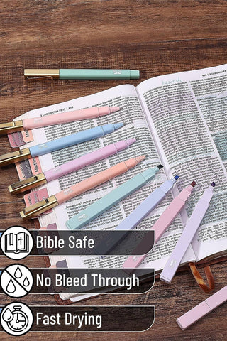 Set of colorful markers on an open Bible with text and icons indicating 'Bible Safe', 'No Bleed Through', and 'Fast Drying'.