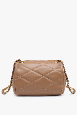 Beige quilted handbag with gold chain on a white background