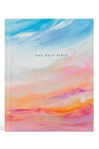 Colorful watercolor-style cover of 'The Holy Bible' on a white background