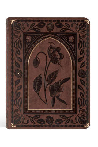 Decorative brown notebook with floral embossing on a white background